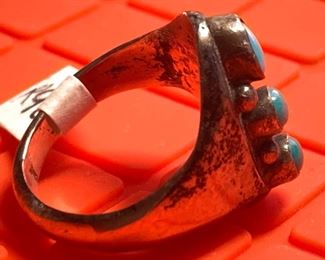Sterling Silver Men’s Ring, 3 small Turquoise stones (not marked)	Size 9.5      Stones measure 1/4 inch by 1/8 inch	
