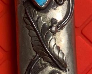Sterling Silver Turquoise lighter case	Measures 2 3/3 inches by 1 inch, stones measure 1/4 inch by 1/2 inch	
