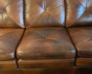 Bonded Leather Nailhead Sofa/Couch	37x91x40in	HxWxD
