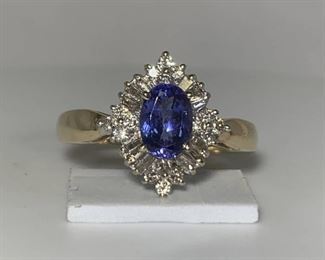 14k YG Oval Tanzanite with Diamond Banquettes and Rounds