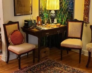 Beautiful Rug
Pair of Antique chairs
Antique desk
Hand Painted Floor Screen