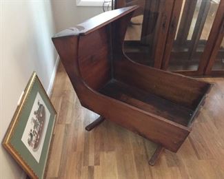 Wooden cradle.
