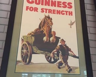 Three large nicely framed Guinness posters.