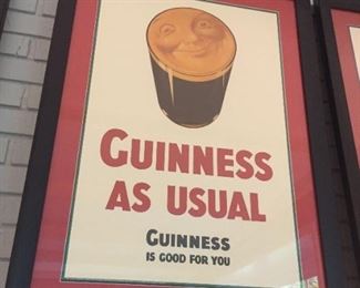 Three large nicely framed Guinness posters.