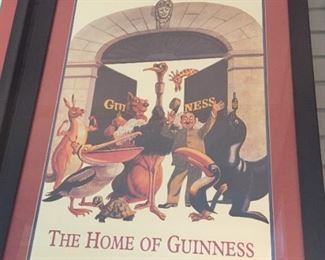 Three large nicely framed Guinness posters.