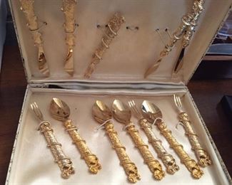 Set of small brass utensils.