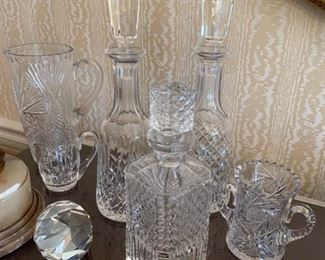 Waterford decanters and pitchers and Tiffany "diamond" paperweight