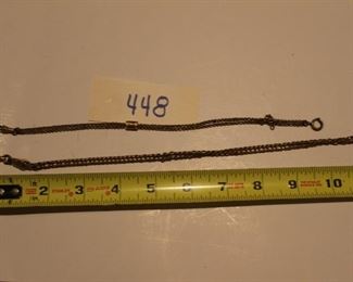 448 - Pair watch chains. Now $4.  Was $8. Not marked