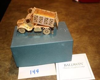144 - Dump Truck Baldwin. Now $8.  Was $10  Gold leaf