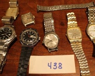 438 - Seven non-working watches $8.00.  Mostly Timex, fake Rolex, etc. 