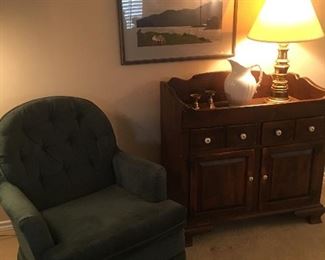 Nice blue green bouncy, swivel chair & side board cabinet. 