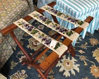 Cherry Luggage Stand, $85, Needlepoint Pansies