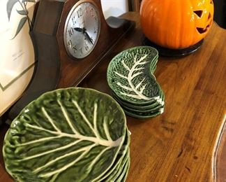 Set 7 Green Majolica Plates,  $85; Set 4 Green Majolica Crescent (Bone) Plates, $75 Ceramic Pumpkin, $35