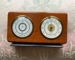 Swift & Anderson wooden weather case with barometer and temperature/humidity dials.