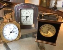 Swiza, Howard Miller and Italian Artale desk clocks.