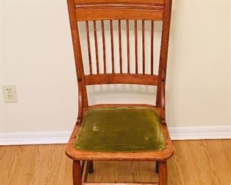 Antique wood chair with green upholstered seat. Dimensions are 17 inches wide by 16 inches deep by 40.5 inches tall. Floor to seat height is 17 inches.