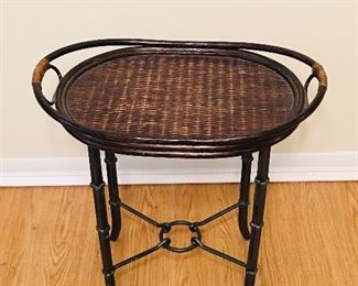 Iron and wicker tray table. Dimensions of removable tray are 19.5 x 13. Dimensions of the iron base is 15.5 inches wide by 11 inches deep by 17.5 inches tall 