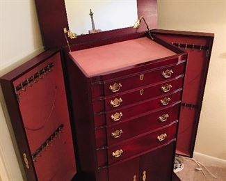 Jewelry Armoire by Powell 1989. Dimensions are 25 inches wide by 15 inches deep by 39.5 inches tall 