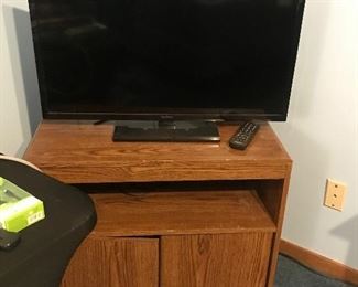 TV with remote, TV stand