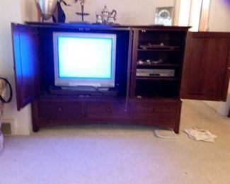 Entertainment Center with three drawers - Nice Finish; Flat Screen TV; and Samsung DVD/VHS Player