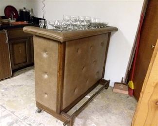 Retro Padded Style Bar with Foot Rail and On Wheels. Has shelf storage on backside!
