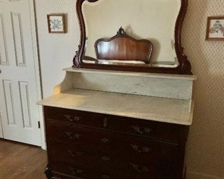 $395 - Antique marble top dresser and mirror 78.5” H by 49”W ( includes mirror ). Dresser is 34.5” tall , Marble is 22.5 “ deep 