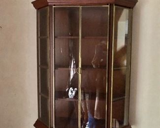 $120 - Glass door wall cabinet.  21" W, 8" D, 28.5" H. 