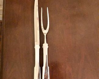 $20 - Stainless steal carving  set.  Knife 13.25" L; fork 10.75" L. 