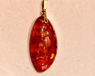 $75 - Amber pendant with 14k bale.  2" L. 