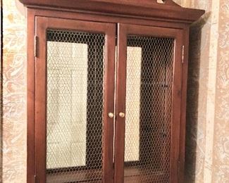 $150 - Wood wall cabinet with wire mesh doors.  25" W, 7" D, 37" H.
