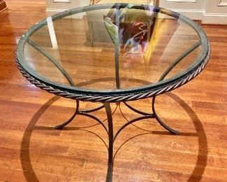 $295 - Glass and metal table with metal rope design on edge - 39" diam, 30" H.