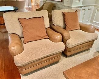 $750 - Pair of Henredon leather, hobnailed armchairs on casters - 35" W, 36" D, 36" H. 