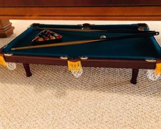 Cute little teeny pool table