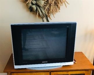 Wreath $16. Samsung TV $20. Coffee table/TV stand (sold)   46" wide x 19" deep $60. 