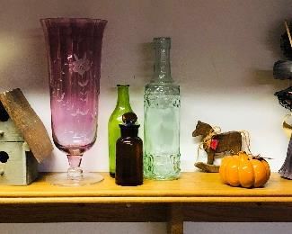 4 pc. Halloween decor (sold) $19. Vintage glass bottles (3) $18. Purple glass vase $22. Bird house 5.5" high $6. Vintage tins $7 ea. 