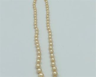 8" strand of pearls $9