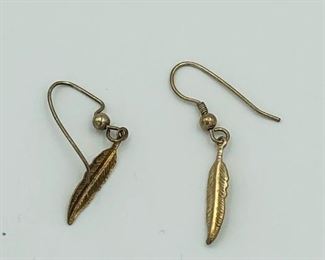 1" feather earrings $5