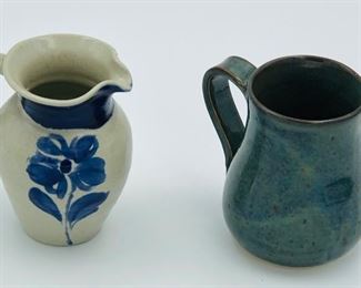 Small Williamsburg pottery pitcher with cobalt blue flower $9. Signed blue/green coffee mug $7