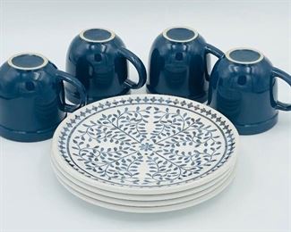 4 matching Cafeware blue mugs $5. 4 Room Retreat plastic plates $5