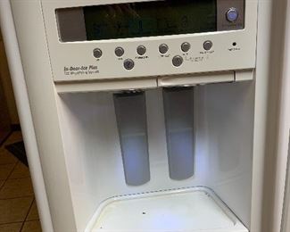 Whirlpool Side-by-Side Refrigerator with ice-maker and water dispenser in door - $500.00