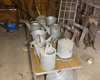 Old wash tubs, watering cans & buckets