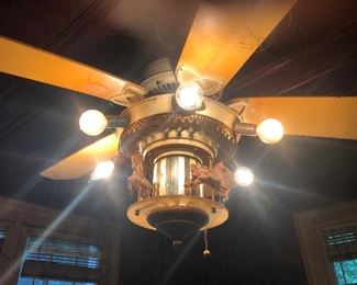 This light fixture has a rotating merry-g0-round!