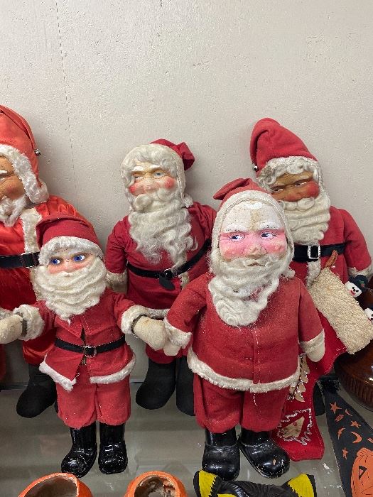 Several Early Mask Face Santas in Various Conditions