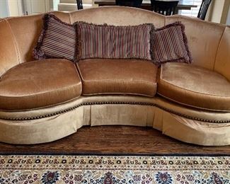 Century Custom curved gold sofa. 