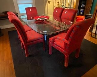 CONTEMPORARY DINING ENSEMBLE - CUSTOM RUG, BEVELED GLASS TOP METAL DINING TABLE AND 6 UPHOLSTERED CHAIRS
