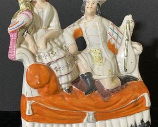 STAFFORDSHIRE Antique Couple On Sofa Figural