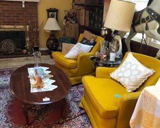 Oval coffee table $80, pair of yellow fabric chairs $250