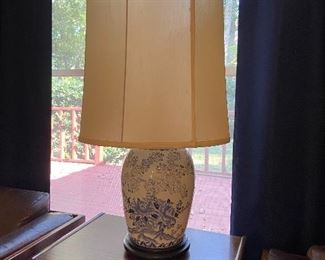 Asian based lamp with huge shade.