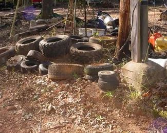 100's of tires, many new with wheels stored inside
