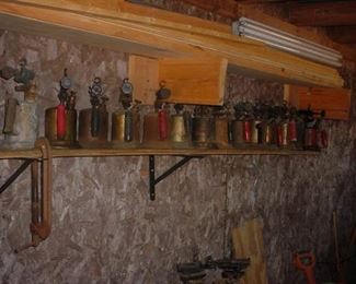 Dozens and dozens of old brass, copper and other blow torches